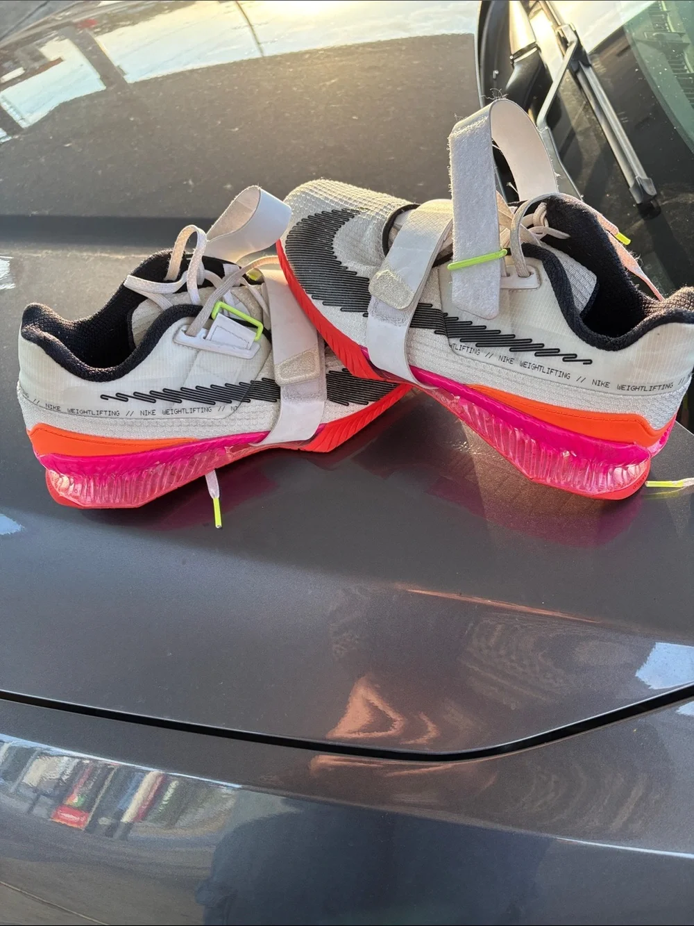 Nike men’s Weightlifting Sneakers in White with Pink and Orange Accents